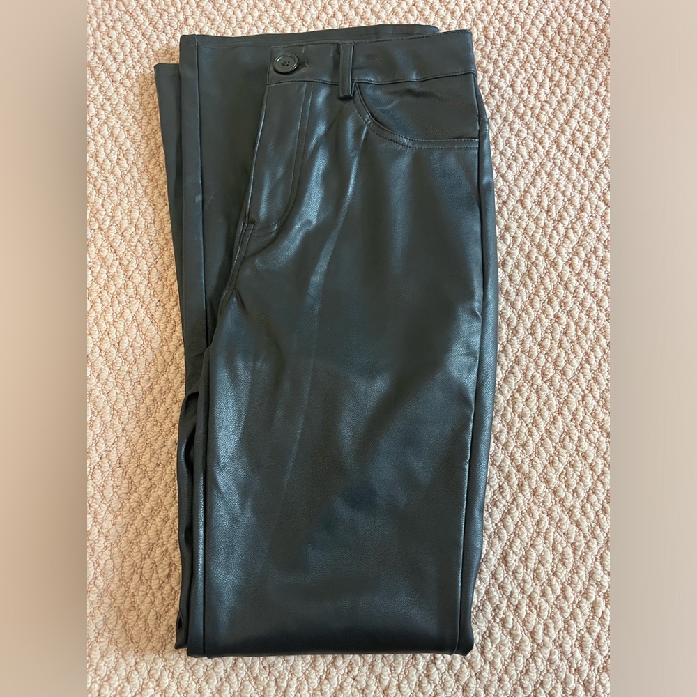 Leather pants flare at bottom